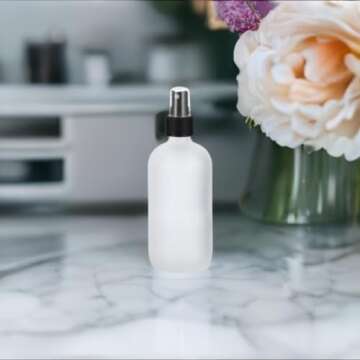 JUVITUS 2 oz Frosted Clear Glass Boston Round Bottle with Black Mist Spray (12 Pack) for Cosmetics, serums, Carrier and Essential Oils, Aromatherapy