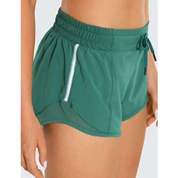 CRZ YOGA Athletic Shorts for Women with Zip Pocket, 2.5" Mid Waist Mesh Liner Shorts for Running Gym Workout Smoky Green Small