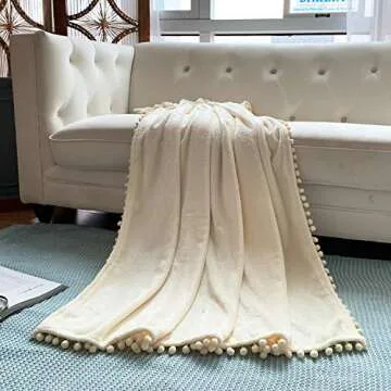 LOMAO Flannel Blanket with Pompom Fringe Lightweight Cozy Bed Blanket Soft Throw Blanket fit Couch Sofa Suitable for All Season(Ivory, 51''x 63'')