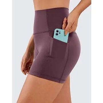 CRZ YOGA Women's Naked Feeling Biker Shorts with Pockets 4'' - High Waisted Yoga Gym Workout Spandex Arctic Plum Small