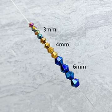 JEBBO 900pcs 6mm Bicone Crystal Beads, Bulk Small Faceted Bicone Glass Beads for Jewelry Making DIY Craft Bracelet Necklace Earring with Container Box (15 Metallic AB Colors)