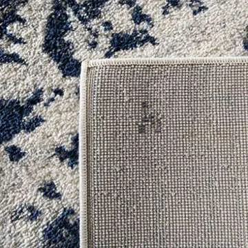 SAFAVIEH Madison Collection Area Rug - 6'7" x 9'2", Cream & Navy, Snowflake Medallion Distressed Design, Non-Shedding & Easy Care, Ideal for High Traffic Areas in Living Room, Bedroom (MAD603D)