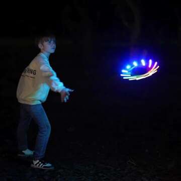 TOSY Flying Ring - 12 LEDs, Super Bright, Soft, Auto Light Up, Safe, Waterproof, Lightweight Frisbee, Cool Birthday, Camping, Easter Basket Stuffers & Outdoor/Indoor Gift Toy for Boys/Girls/Kids