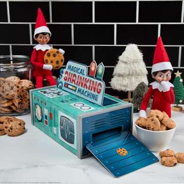 The Elf on the Shelf Insta-Props 2-in-1 Scene Kit with Reversible Pop Out Backdrop - Hot Cocoa Stand and Magic Shrinking Machine Scenes with Accessories
