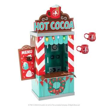 The Elf on the Shelf Insta-Props 2-in-1 Scene Kit with Reversible Pop Out Backdrop - Hot Cocoa Stand and Magic Shrinking Machine Scenes with Accessories