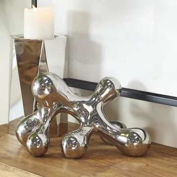 CosmoLiving Abstract Decorative Sculpture in Silver
