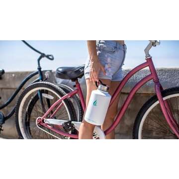 HYDRO CELL Stainless Steel Insulated Water Bottle with Straw - For Cold & Hot Drinks - Metal Vacuum Flask with Screw Cap and Modern Leakproof Sport Thermos for Kids & Adults (White 64oz)