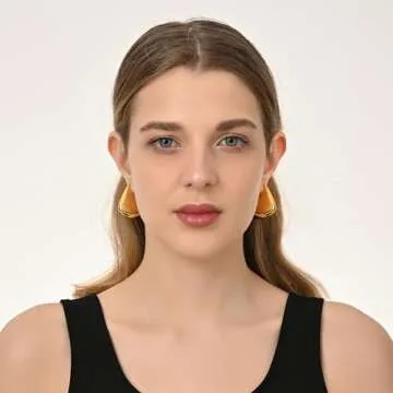 SHERLOVE Gold Earrings for Women Trendy,Dupes Earrings Lightweight Hollow Fin Shaped 18K Gold Plated...