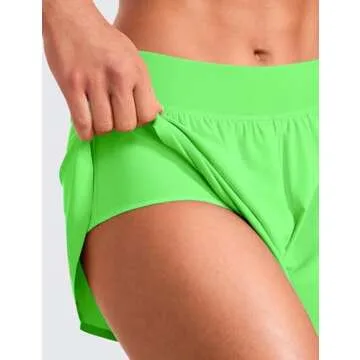 CRZ YOGA Mid Waisted Dolphin Athletic Shorts for Women 4" Lightweight High Split for Gym Workout with Liner Quick Dry Neon Apple Green Medium