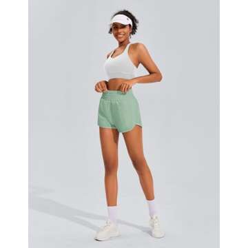 PINSPARK Women Athletic Shorts Quick Dry Running Short Workout Gym High Waisted Sports Wear with Zip Pockets, Green Mist, Small