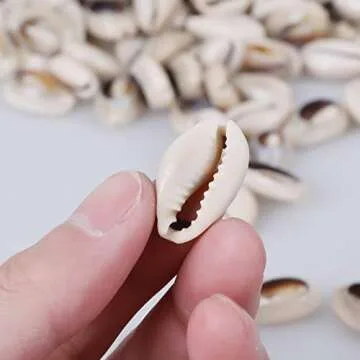 150 PCS 0.63"-0.71" Natural Strong Cowrie Shell Beads Smooth Cut Oval Seashells, Beach Seashells with Big Hole for DIY Craft Jewelry Making, Adorning Hair Locks and Braids