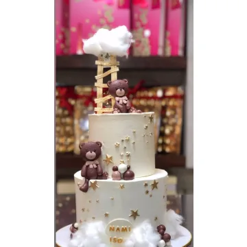 کیک تولد خرس قهوه‌ای دوطبقه کرم بیبی شاور کودک ستاره طلایی ابرها