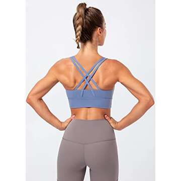Lavento Women's Strappy Sports Bra Long Line Medium Support Energy Workout Training Top (2026 Baby Blue, Small)