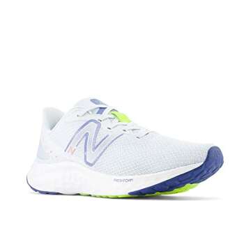 New Balance Women's Fresh Foam Arishi V4 Running Shoe, Ice Blue/Night Sky/Pink Moon, 7
