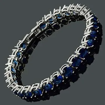 RIZILIA Round Cut Simulated Blue Sapphire CZ 18K Gold Plated Tennis Bracelet, 7"