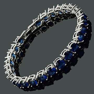 RIZILIA Round Cut Simulated Blue Sapphire CZ 18K Gold Plated Tennis Bracelet, 7"
