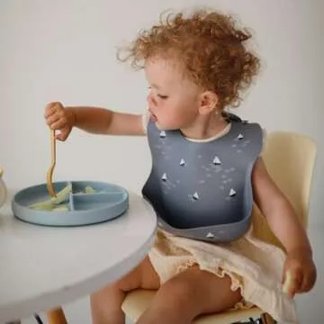 Mushie Silicone Baby Bib | Adjustable Fit and Waterproof