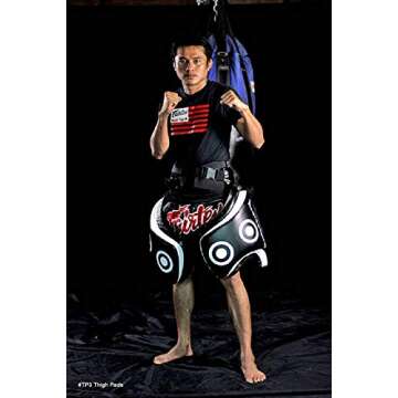 Fairtex Thigh Pads with Syntek Leather - Heavy Duty, Maximum Shock Absorbency for Muay Thai & Kickboxing. Durable, Comfortable, and Versatile Training Gear(Black/Standard)
