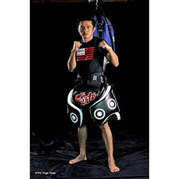 Fairtex Thigh Pads with Syntek Leather - Heavy Duty, Maximum Shock Absorbency for Muay Thai & Kickboxing. Durable, Comfortable, and Versatile Training Gear(Black/Standard)