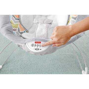 Fisher-Price Sweet Snugapuppy Deluxe Bouncer, portable bouncing baby seat with overhead mobile, music, and calming vibrations