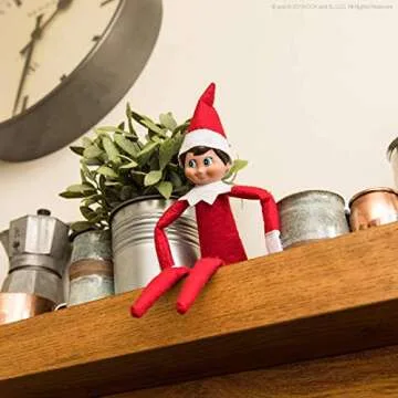 The Elf on the Shelf: A Christmas Tradition - Boy Scout Elf with Brown Eyes - Includes Artfully Illustrated Storybook, Keepsake Box and Official Adoption Certificate