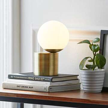 Amazon Brand – Rivet Modern Glass Globe Living Room Table Desk Lamp With LED Light Bulb - 7 x 10 Inches, Brass Finish