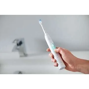 Philips Sonicare ProtectiveClean 5100 Rechargeable Electric Toothbrush, with Pressure Sensor, 3 Cleaning Modes, SmarTimer and QuadPacer, 14-Day Battery Life, Travel Case, White, Model HX6857/11