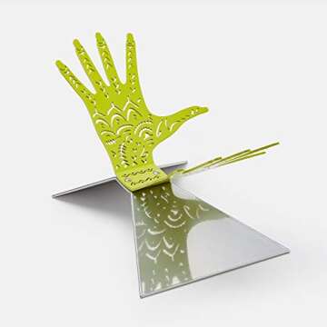 The Rihanna Book: Limited Edition (Fenty x Phaidon) featuring a Tattooed Hand Stand