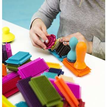 B. toys- Bristle Block - Stackadoos- Sort & Stack STEM Building Blocks Set – 68 Interlocking Blocks- toys For Toddlers, Kids - Storage Jar With Lid – 2 Years +