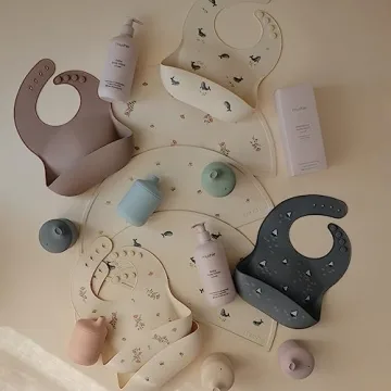 Mushie Silicone Baby Bib | Adjustable, Waterproof & Stylish