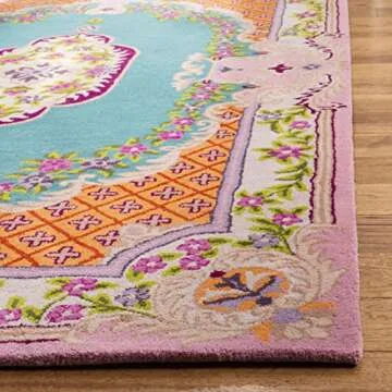 SAFAVIEH Bellagio Collection Area Rug - 5' x 8', Blue & Pink, Handmade Medallion Wool, Ideal for High Traffic Areas in Living Room, Bedroom (BLG535M)