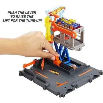 Hot Wheels City Toy Car Track Set Downtown Repair Station Playset with 1:64 Scale Vehicle, Working Lift & Launcher