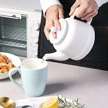 Sweejar 35 oz Porcelain Tea Pot, Teapot with Removable 18/8 Stainless Steel Infuser, Microwave & Dishwasher Safe Tea Maker, Tea Infuser Pots for Blooming loose Leaf Tea,Chrismas Women Gift (White)