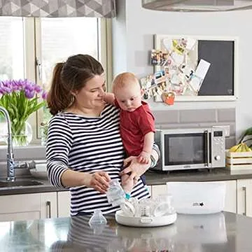 Tommee Tippee Microwave Steam Sterilizer for Baby Bottles and Accessories, Kills Viruses and 99.9% of Harmful Microbes, 4-Minute Sterilisation Cycle
