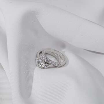 Amazon Essentials Sterling Silver Platinum Plated Infinite Elements Cubic Zirconia Three Stone Ring, Size 6 (previously Amazon Collection)