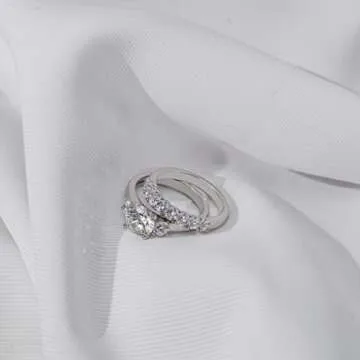 Amazon Essentials Sterling Silver Platinum Plated Infinite Elements Cubic Zirconia Three Stone Ring, Size 6 (previously Amazon Collection)