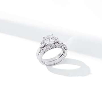 Amazon Essentials Sterling Silver Platinum Plated Infinite Elements Cubic Zirconia Three Stone Ring, Size 6 (previously Amazon Collection)