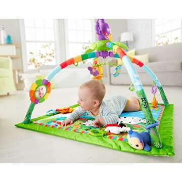 Fisher-Price Baby Playmat Rainforest Music & Lights Deluxe Gym with 10+ Activities & Toys for Develo...