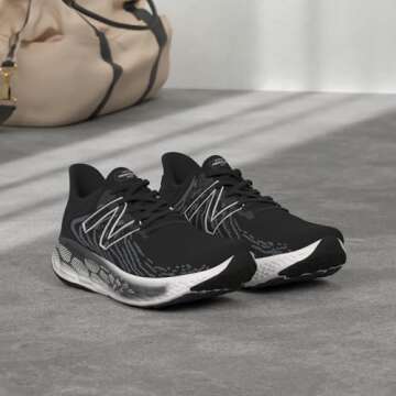 New Balance Women's Fresh Foam 1080 V11 Running Shoe, Black/Thunder, 8