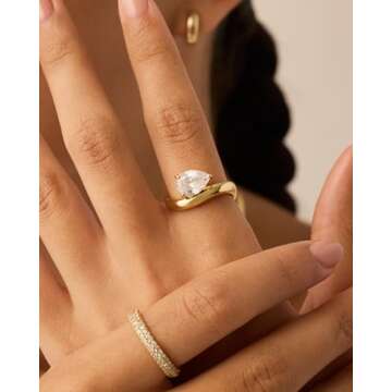 PAVOI 14K Yellow Gold Plated Pear Solitaire Premium Cubic Zirconia Engagement Ring for Women | Trend...