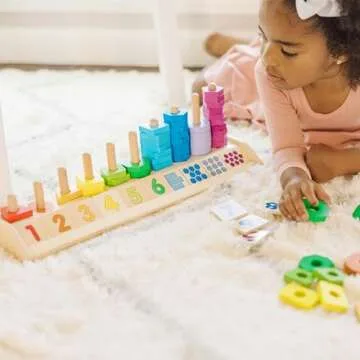 Melissa & Doug Wooden Shape Stacker Educational Toy for Kids