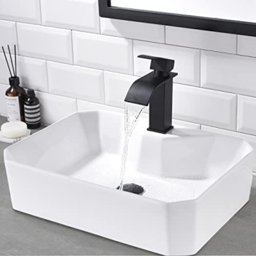 Elegant White Ceramic Bathroom Sink with Black Faucet
