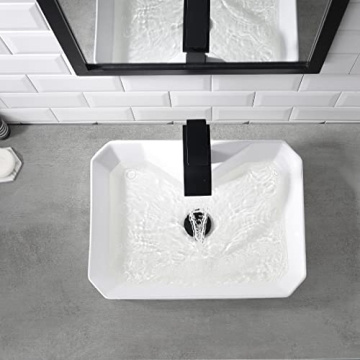 Elegant White Ceramic Bathroom Sink with Black Faucet