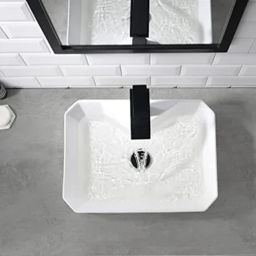 Elegant White Ceramic Bathroom Sink with Black Faucet