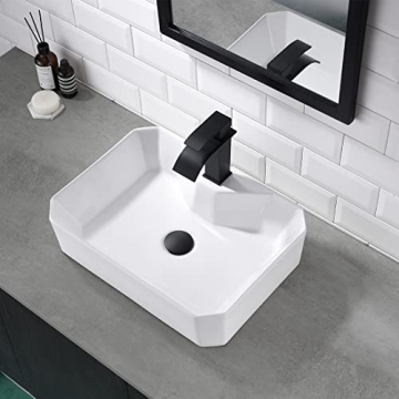 Elegant White Ceramic Bathroom Sink with Black Faucet