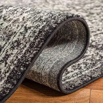 SAFAVIEH Evoke Collection Area Rug - 8' x 10', Black & Grey, Oriental Distressed Design, Non-Shedding & Easy Care, Ideal for High Traffic Areas in Living Room, Bedroom (EVK256R)