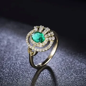 Elegant 18K Yellow Gold Pave Diamond Ring with Emerald