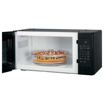 GE Profile PEM31DFBB 24" 1.1 cu. ft. Capacity counter top Microwave Oven in Black