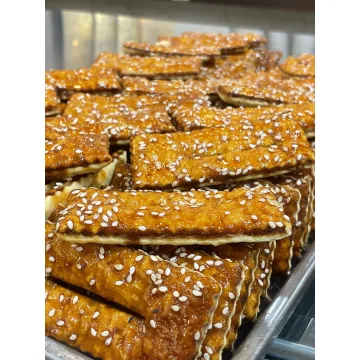 شیرینی زبان کنجدی ترد | خرید شیرینی سنتی ایرانی خوش‌عط?...