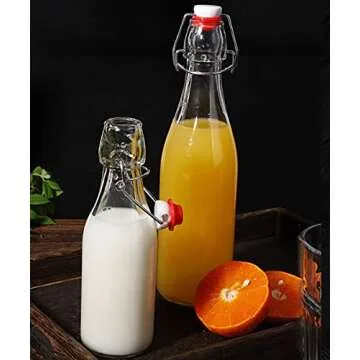 XZF Swing Top Clear Glass Bottles Brewing Bottles 1000ml 33 fl. oz. Flip Top Bottles Great for Oil Vinegar Beverages Homemade Juices Kombucha Water Beer Set of 4, XZF001